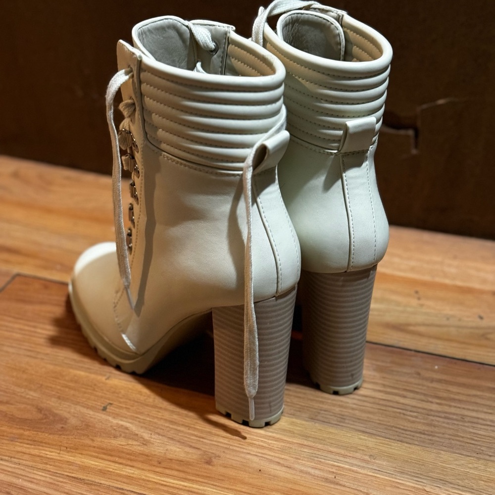 Brand new never worn heeled boots